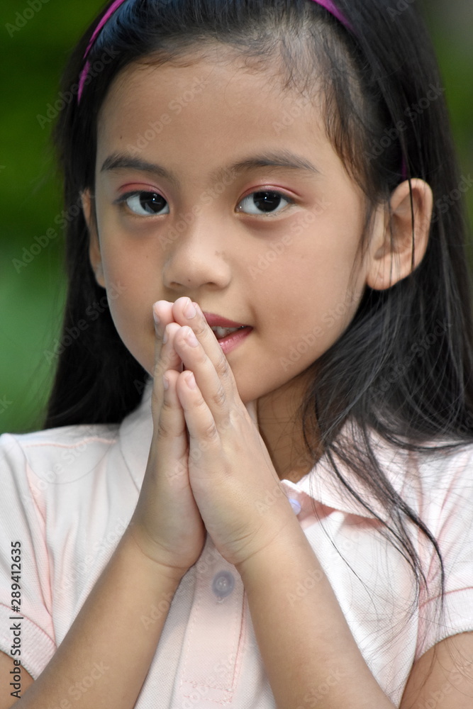 A Beautiful Filipina Female Praying A Beautiful Filipina Female Praying