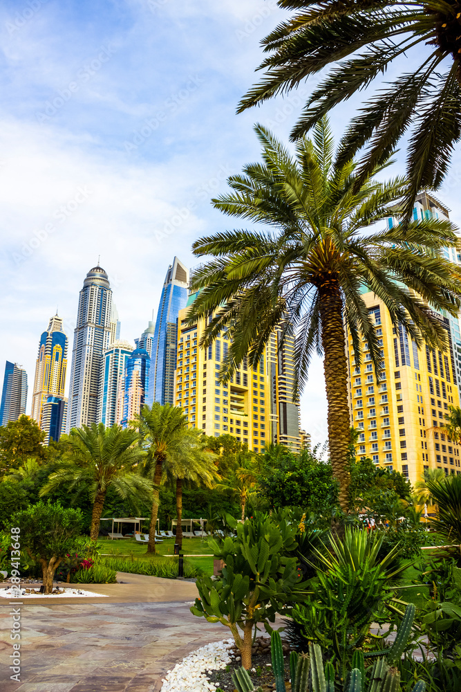 High-rise houses of modern futuristic design of Dubai Marina district.