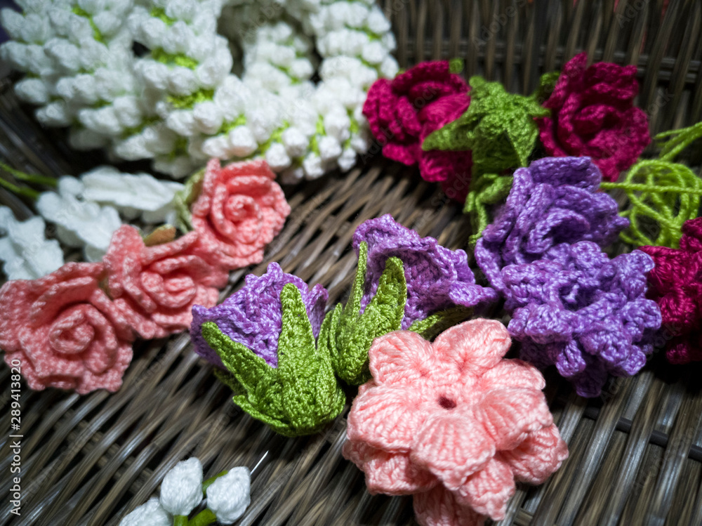 Garland of flowers from knitting with yarn
