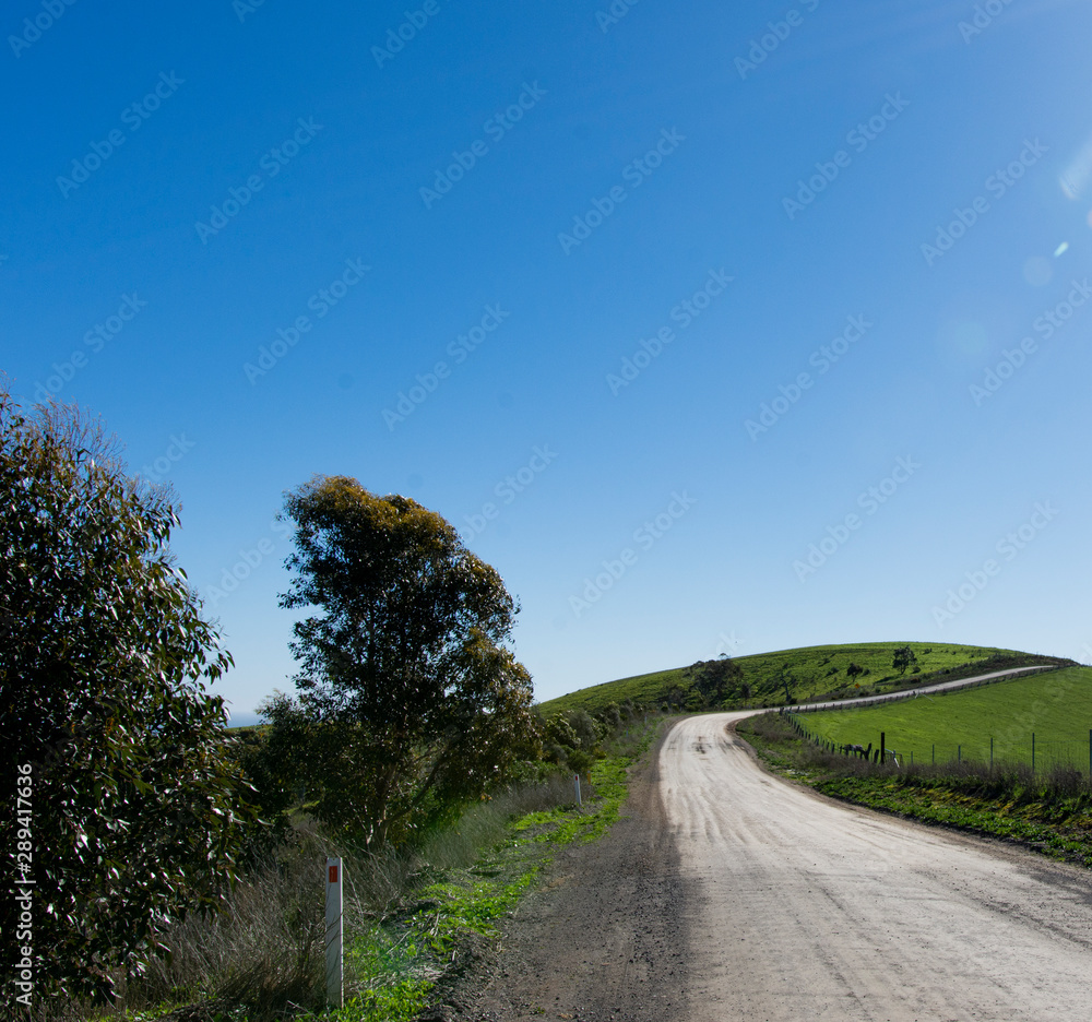 Naklejka premium Off road street with view on hills Australia 2019
