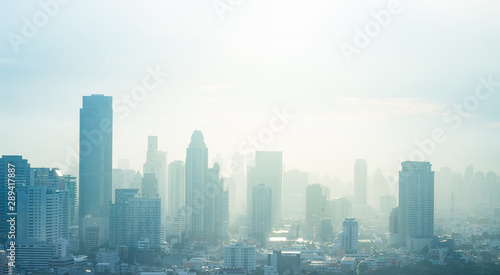 Skyscraper day concept: Abstract skyline sunset background. Bangkok city, Thailand Asia © Choat