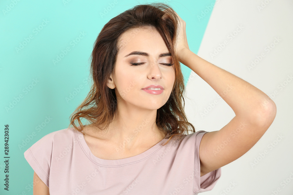 Smiling woman in casual clothes on color background Smiling woman in casual clothes on color background