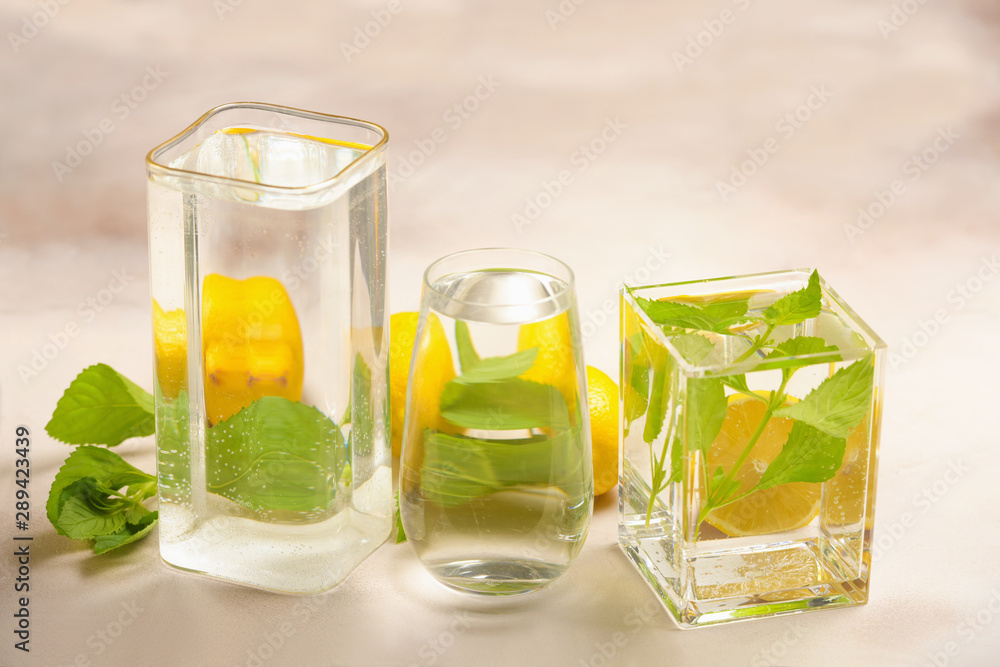 Foods distorted through liquid and glass on light background. Foods distorted through liquid and glass on light background.