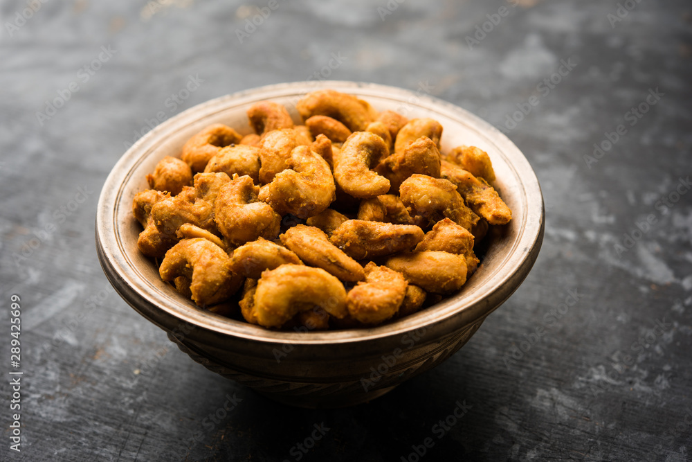 Kaju Pakoda/pakora OR Cashew Nut Fritters or bhajji, is a tasty snack from India, served as Chakna Kaju Pakoda/pakora OR Cashew Nut Fritters or bhajji, is a tasty snack from India, served as Chakna