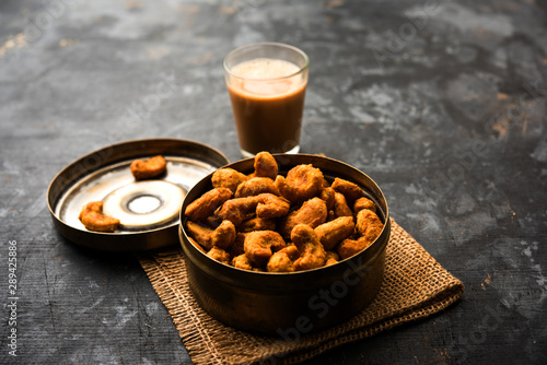 Kaju Pakoda/pakora OR Cashew Nut Fritters or bhajji, is a tasty snack from India, served as Chakna photo