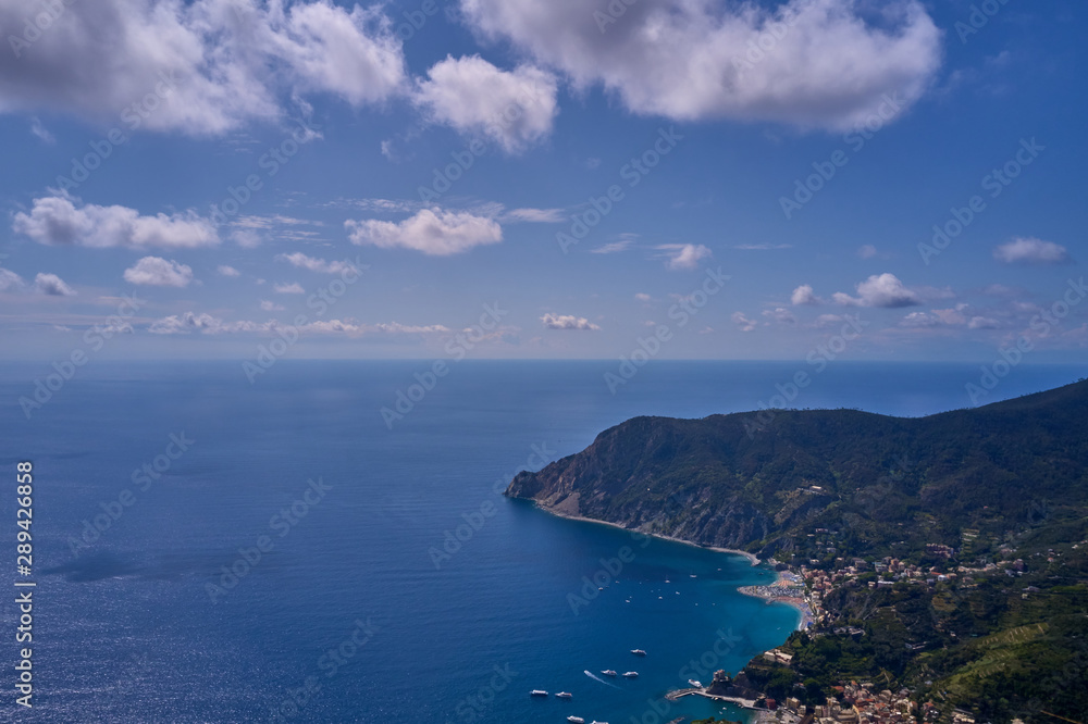 Panorama view of Monterosso al Mare village one of Cinque Terre in La Spezia, Italy. Flight by a drone.