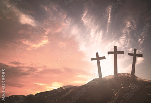 Fényképezés Three crosses on mountain sunrise background