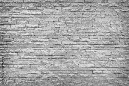 Gray slate wall stone background or texture.