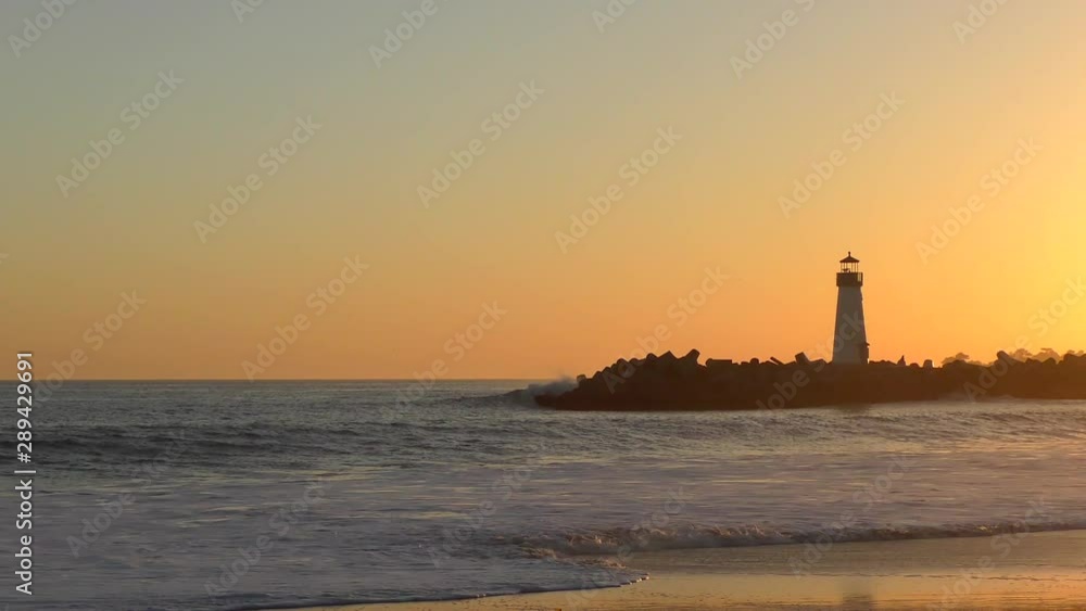 The Pacific Ocean at the Santa Cruz Breakwater (aka Walton) Lighthouse at sunset, in Santa Cruz, California, USA The Pacific Ocean at the Santa Cruz Breakwater (aka Walton) Lighthouse at sunset, in Santa Cruz, California, USA