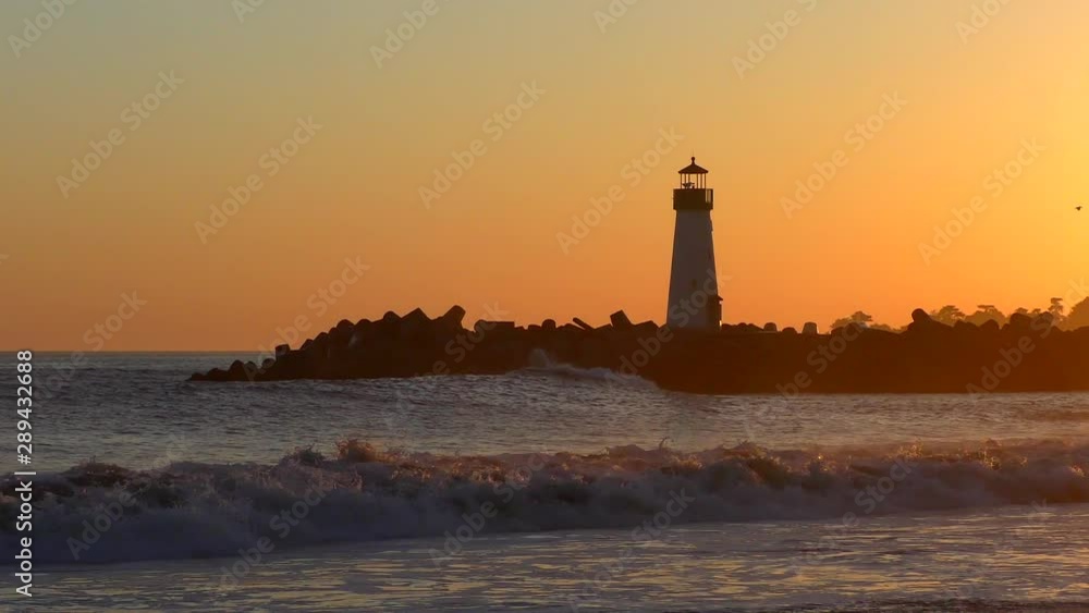 The Pacific Ocean at the Santa Cruz Breakwater (aka Walton) Lighthouse at sunset, in Santa Cruz, California, USA The Pacific Ocean at the Santa Cruz Breakwater (aka Walton) Lighthouse at sunset, in Santa Cruz, California, USA