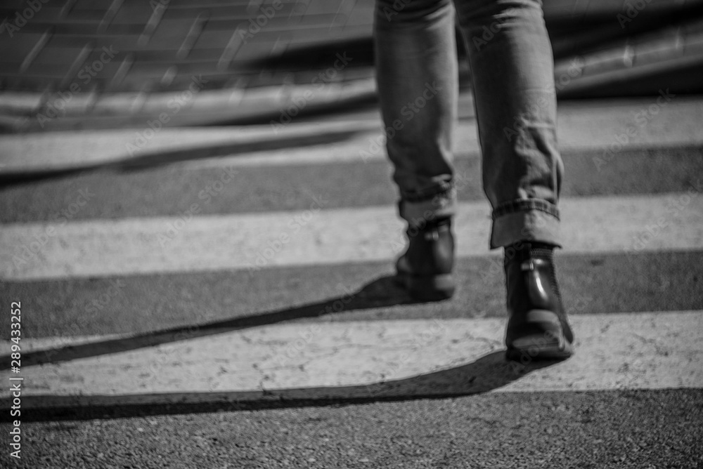 Walking over a pedestrian crossing Walking over a pedestrian crossing
