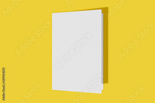 Mockup vertical booklet, brochure, invitation isolated on a yellow background with hard cover and realistic shadow. 3D rendering.