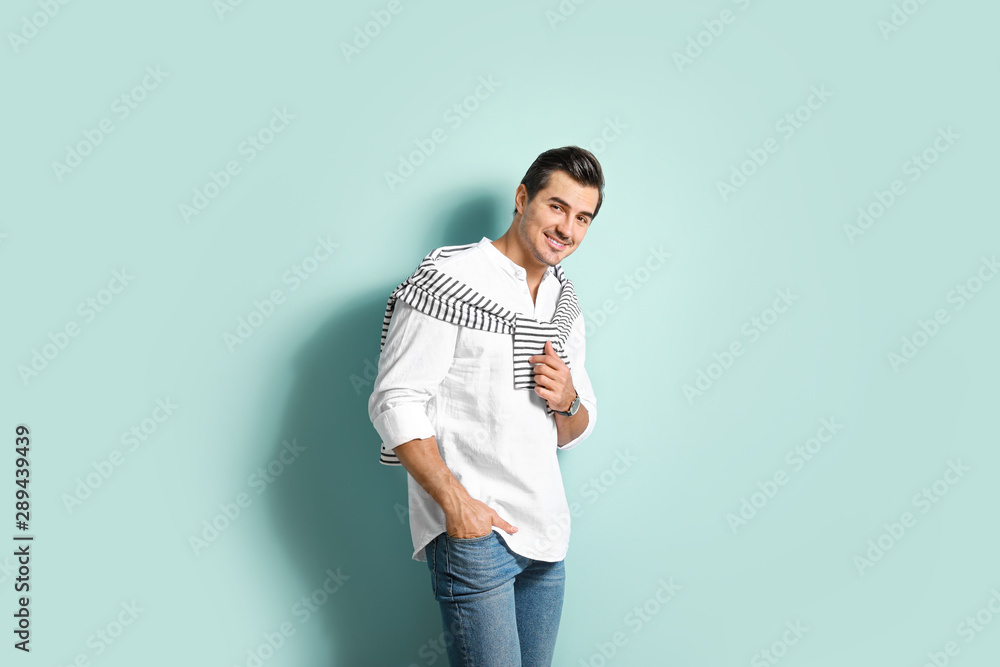 Stylish fashionable man on color background Stylish fashionable man on color background