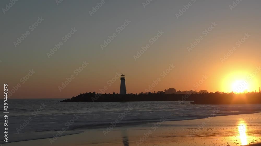 The Pacific Ocean at the Santa Cruz Breakwater (aka Walton) Lighthouse at sunset, in Santa Cruz, California, USA The Pacific Ocean at the Santa Cruz Breakwater (aka Walton) Lighthouse at sunset, in Santa Cruz, California, USA