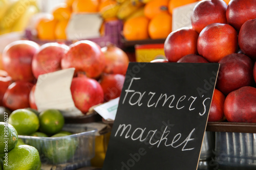 Assortment of fresh fruits on counter at farmer's market