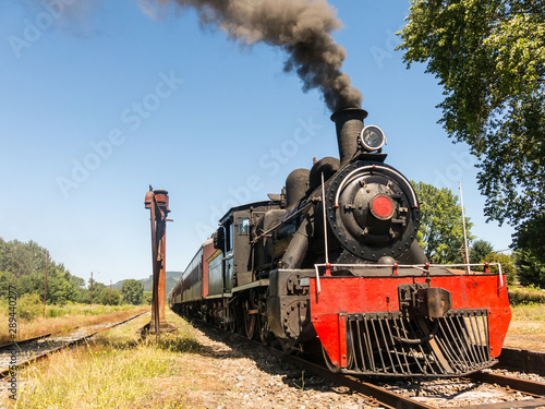 Tourist train called Valdiviano that runs from Valdivia to Antilhue with a 1913 North British locomotive type 57. Los Rios Region, in southern Chile.