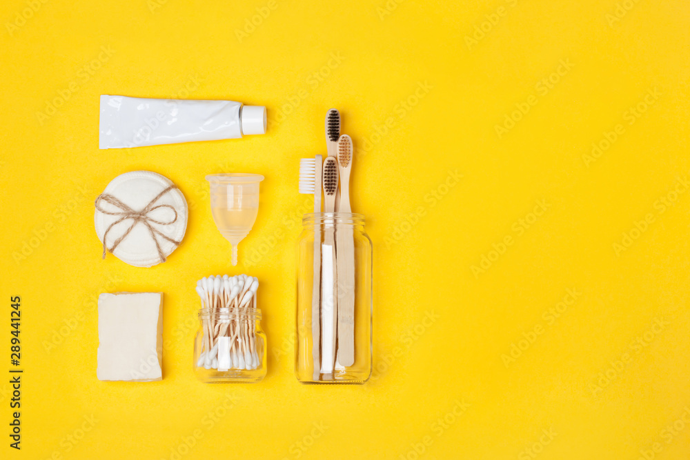 Set of eco-friendly plastic-free body care items on the yellow background. Copy space. Zero waste concept, plastic-free, organic, eco-friendly shopping Set of eco-friendly plastic-free body care items on the yellow background. Copy space. Zero waste concept, plastic-free, organic, eco-friendly shopping