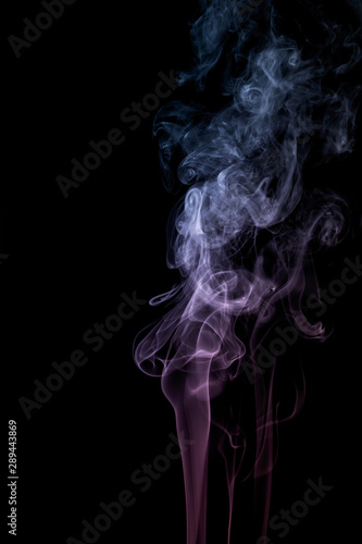 Fototapeta Naklejka Na Ścianę i Meble -  Colourful smoke on dark background