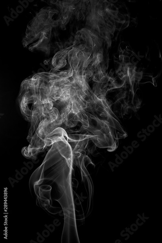 Fototapeta Naklejka Na Ścianę i Meble -  White smoke on dark background