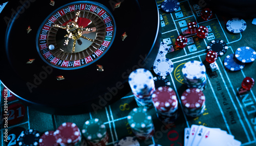 Poker Chips with roulette, gambling games concept.