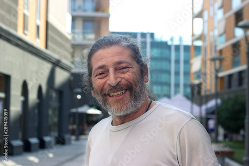 Middle aged man, looking at camera and smiling