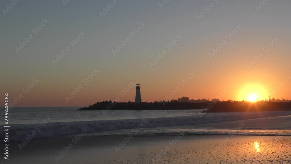 The Pacific Ocean at the Santa Cruz Breakwater (aka Walton) Lighthouse at sunset, in Santa Cruz, California, USA The Pacific Ocean at the Santa Cruz Breakwater (aka Walton) Lighthouse at sunset, in Santa Cruz, California, USA
