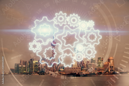 Double exposure of business theme hologram drawing and city veiw background. Concept of success.