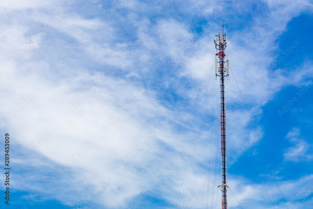 Cell phone tower with blue sky background on a sunny day. Cell phone tower with blue sky background on a sunny day.