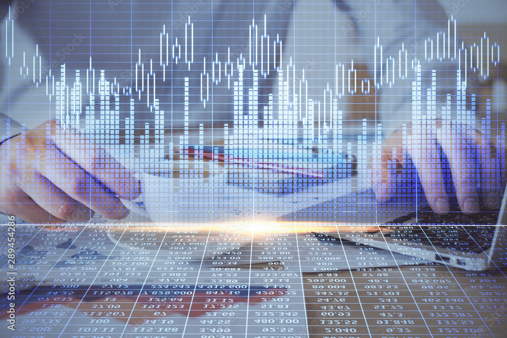 Forex graph with businessman working on computer in office on background. Concept of hardworking. Double exposure. Forex graph with businessman working on computer in office on background. Concept of hardworking. Double exposure.