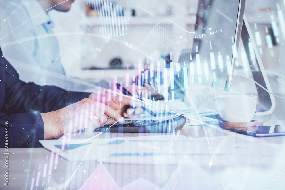 Forex graph with businessman working on computer in office on background. Concept of hardworking. Closeup. Multi exposure.