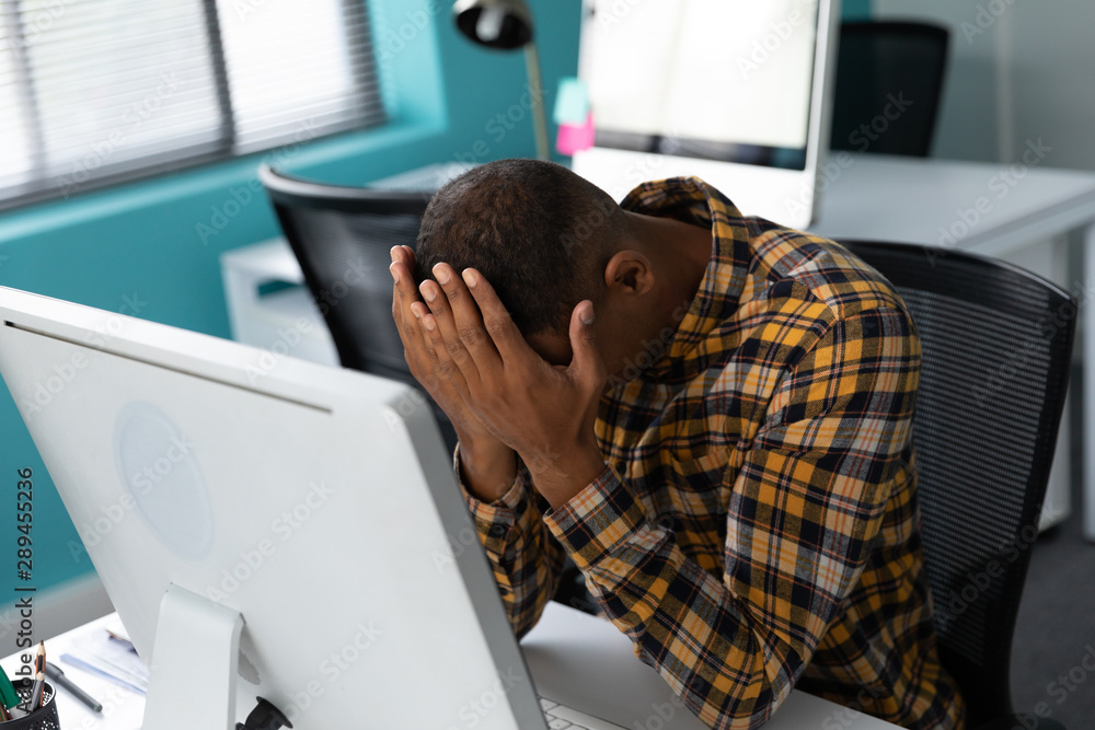 Young male creative working in a modern office Young male creative working in a modern office