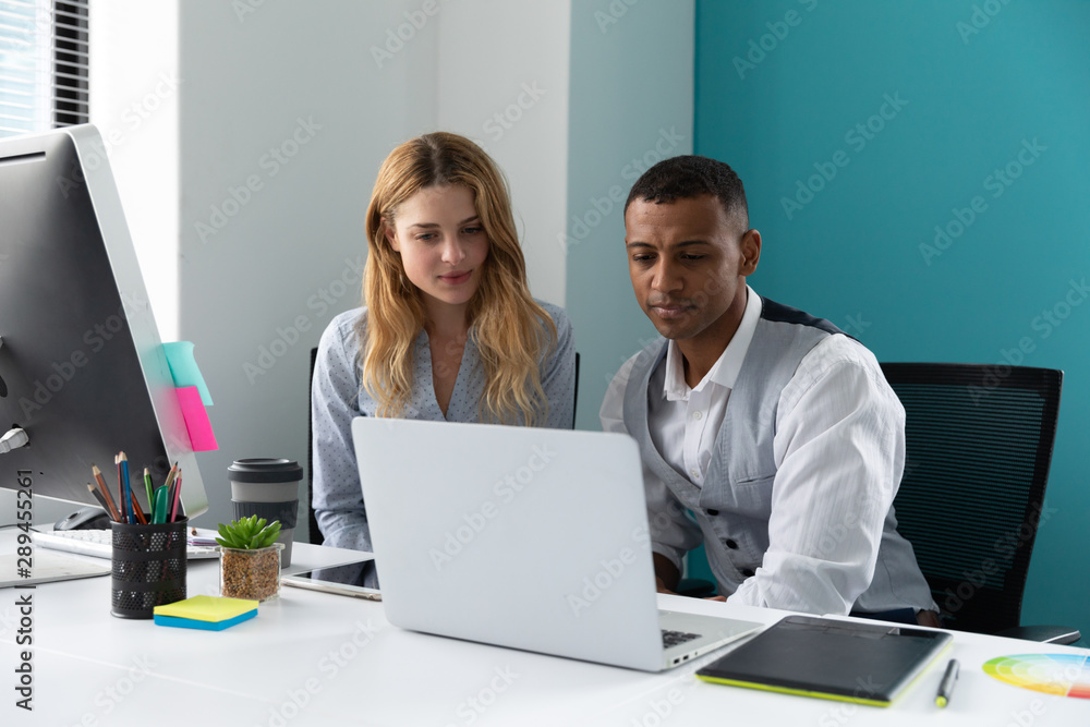 Young creatives working in a modern office Young creatives working in a modern office