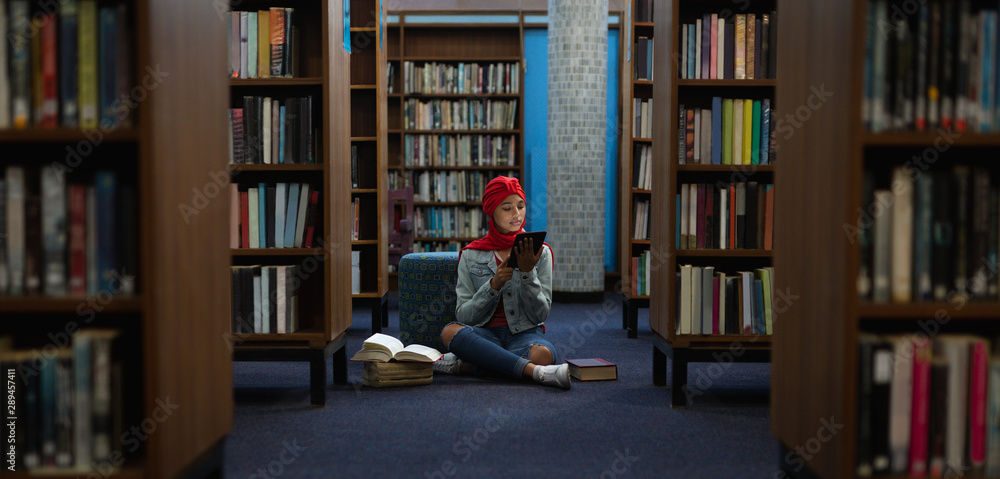 Young woman studying in library Young woman studying in library