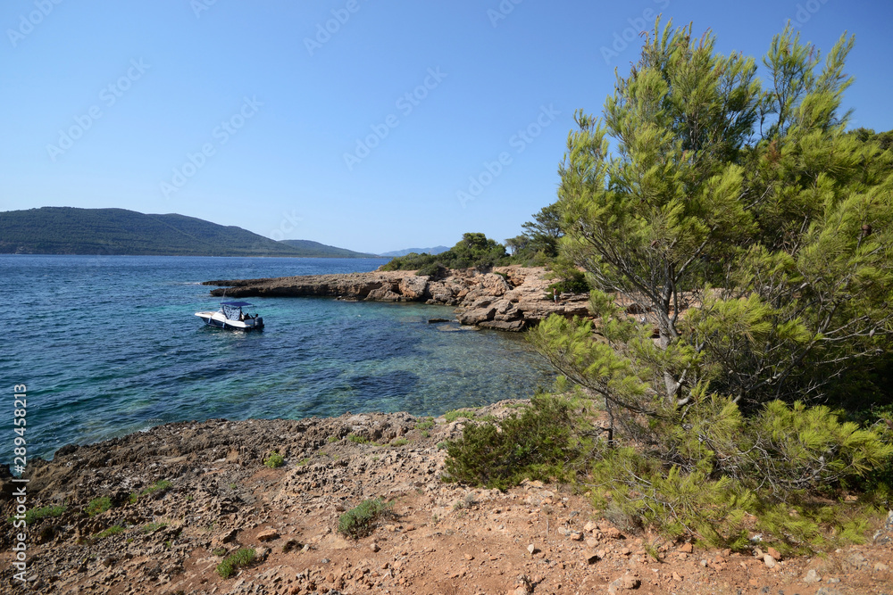 Cala Bramassa in the coast of mediterranean sea of Porto Conte natural park, Sardinia Island, Italy