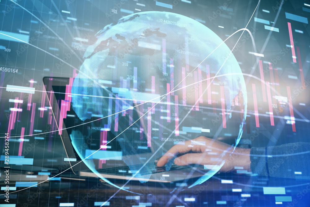 Double exposure of man's hands writing notes of stock market with forex graph background. Concept of research and trading. Double exposure of man's hands writing notes of stock market with forex graph background. Concept of research and trading.