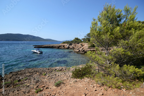 Cala Bramassa in the coast of mediterranean sea of Porto Conte natural park, Sardinia Island, Italy