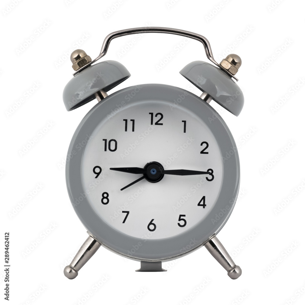 A gray clock with an alarm clock on a white background with arrows showing the time nine hours fifteen minutes or twenty one hours and fifteen minutes A gray clock with an alarm clock on a white background with arrows showing the time nine hours fifteen minutes or twenty one hours and fifteen minutes
