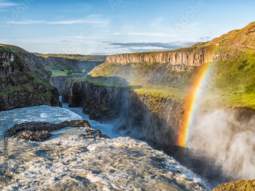 Gullfoss wild waterfall  strong running water and rainbow  Iceland