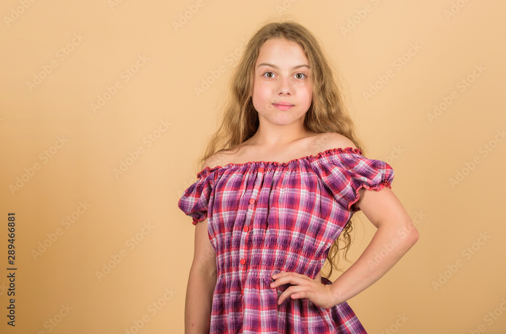 Ambitious and beautiful. happy small girl with long healthy hair. hair health and care. hairdresser salon. kid fashion. long blond curly hair. beautiful little girl fashion model. small kid in dress Ambitious and beautiful. happy small girl with long healthy hair. hair health and care. hairdresser salon. kid fashion. long blond curly hair. beautiful little girl fashion model. small kid in dress
