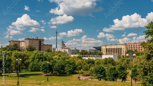City landscape with a view of VDNKh Exhibition of Achievements of the National Economy) in Moscow, a statue of the Worker and the Farmer and Ostankino TV Tower