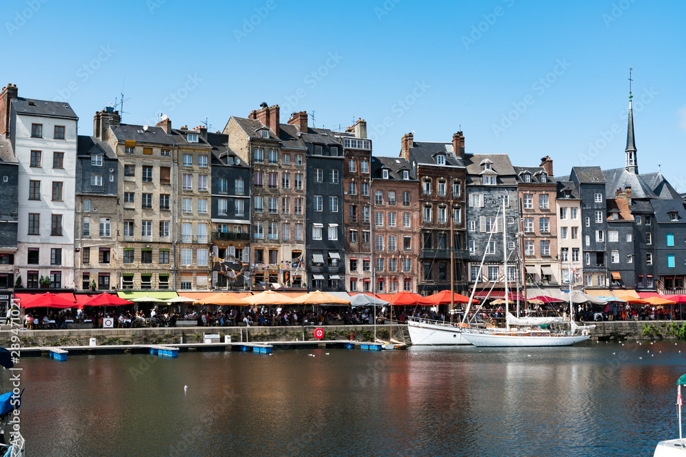 the old port and reataurant district in the historic city of Honfleur in Normandy