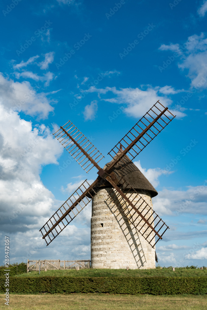 vertical view of the historic windmill Moulin de Pierre in Hauville in Normandy