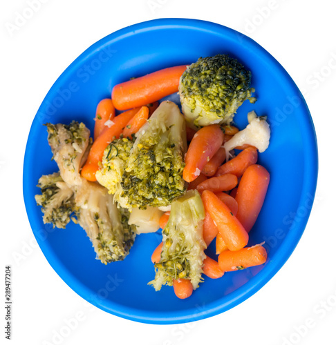 provencal vegetables on a plate.grilled vegetables on a plate isolated on white background.broccoli and carrots on a plate top view.healthy  food