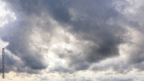 Aerial image of dark Storm clouds over the land. Aerial panorama of storm clouds. Panorama of thunder clouds. View from drone. Aerial bird's eye view. Aerial top view cloudscape. Texture of clouds.