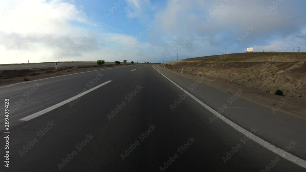 POV from the legendary Panamericana street in a desert in South America, Peru POV from the legendary Panamericana street in a desert in South America, Peru