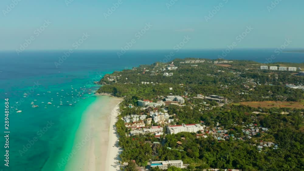 Houses and streets on the island of Boracay, Philippines, top view. Hotels and buildings on the big island. Landscape on a sunny day. Houses and streets on the island of Boracay, Philippines, top view. Hotels and buildings on the big island. Landscape on a sunny day.