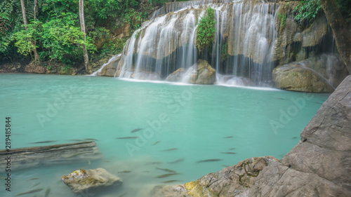 Waterfall in rain forest at Erawan National Park at Kanchanaburi in Thailand