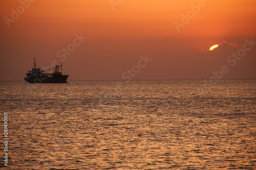 Ship silhouette and sunset © Photo_by_Tomo