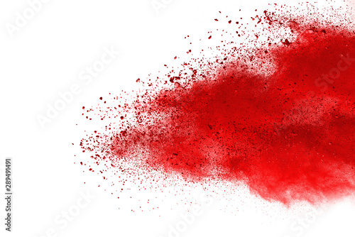 Red powder explosion on white background. 