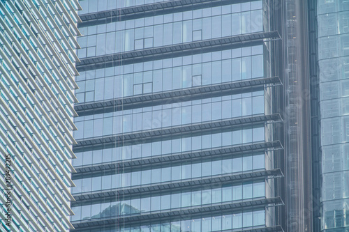 facade of skyscraper business center close-up of the city background